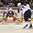 GRAND FORKS, NORTH DAKOTA - APRIL 14: Russia's Maxim Zhukov #30 tracks the puck following USA's Logan Brown's #27 shot during preliminary round action at the 2016 IIHF Ice Hockey U18 World Championship. (Photo by Minas Panagiotakis/HHOF-IIHF Images)

